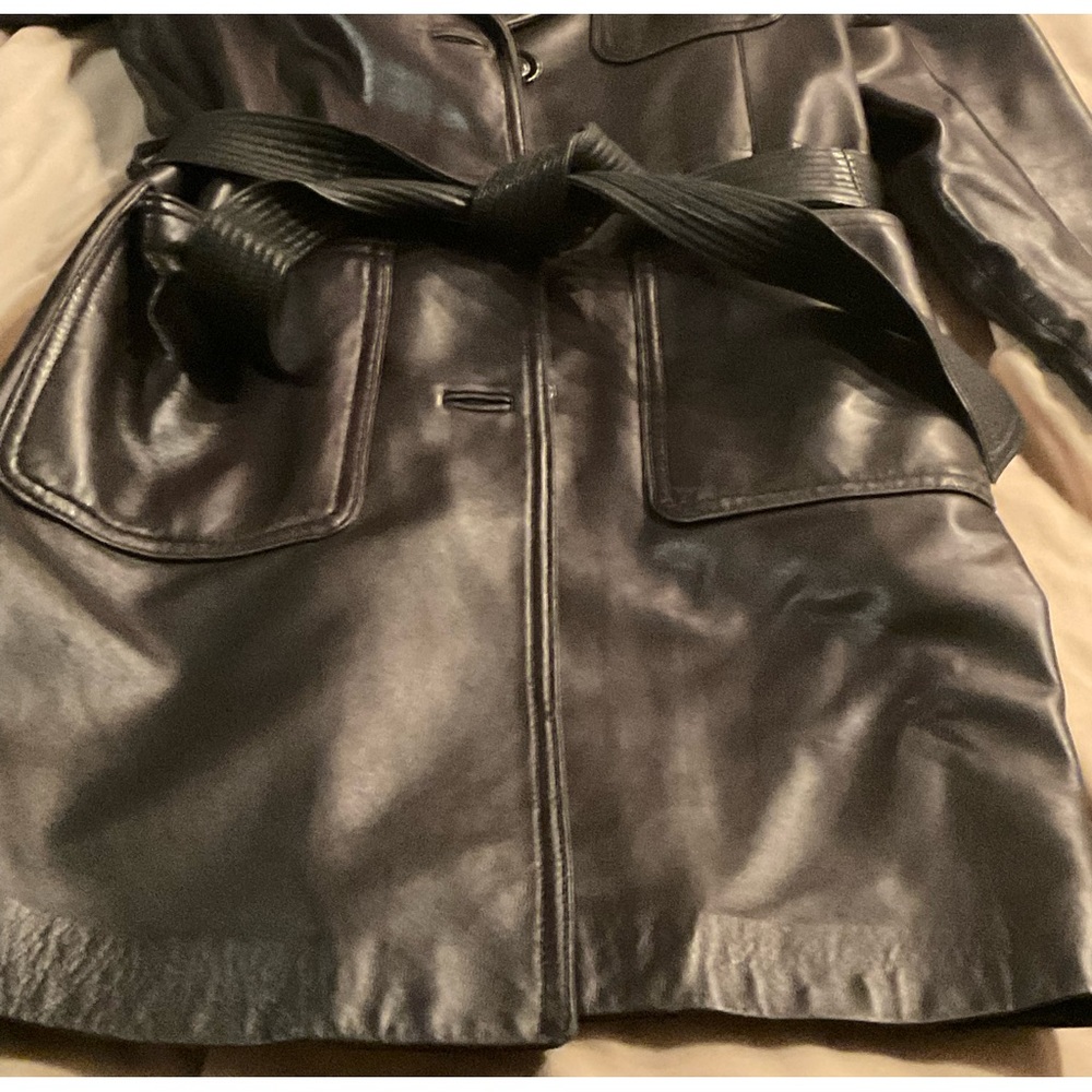 Beautiful and warm full length Leather coat. In great condition.